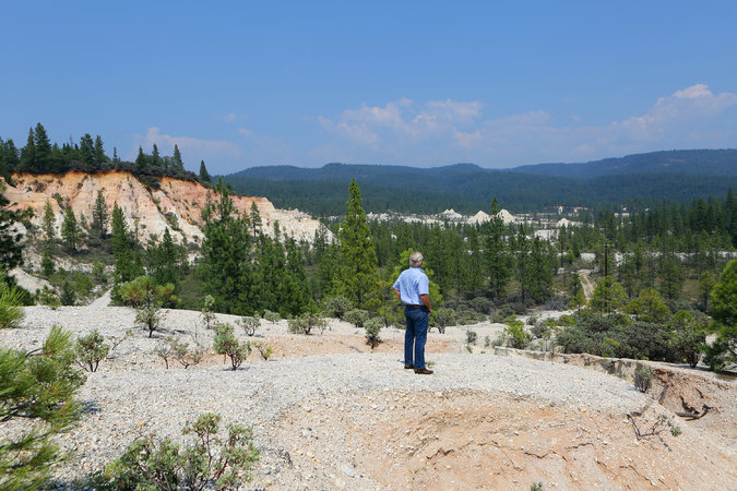 Tim Callaway looking out over his gold mine. He operated the mine in the 1990s and wants to again extract the valuable ore. (Photo by  Jim Wilson/The New York Times)